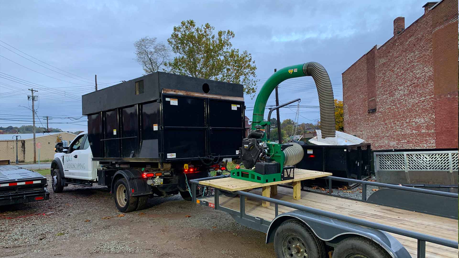 A truck loading mulch